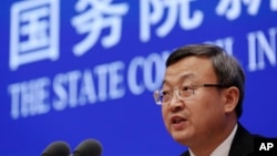 中國商務部副部長王受文在記者會上介紹《關於中美經貿磋商的中方立場》白皮書。（2019年6月2日）