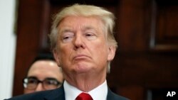 Presiden Amerika Serikat Donald Trump di ruang Roosevelt, Gedung Putih, Washington DC, 12 Oktober 2017.