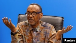 Rwanda's President Paul Kagame addresses a press conference at the Kigali Convention Center, in Kigali