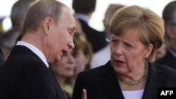 Володимир Путін і Ангела Меркель
