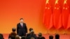 Le président Xi a prononcé son discours depuis la porte Tiananmen, l'endroit même où son lointain prédécesseur Mao Tsé-toung proclama la République populaire le 1er octobre 1949.