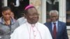 FILE - Monseigneur Marcel Utembi, a Catholic church mediator arrives for a meeting in Kinshasa, Democratic Republic of Congo, Wednesday, Dec. 21, 2016.