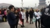 资料照：在中国全国政协会议开幕前告状民众出现在北京天安门广场旁。（2018年3月3日）