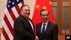 中国外长王毅和美国国务卿蓬佩奥2018年6月14日在北京人民大会堂会晤。