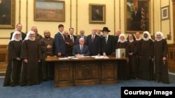 Handout photo from Indiana Governor Mike Pence's office on the signing of the RFRA on March 26.