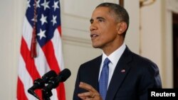 FILE - U.S. President Barack Obama announces executive actions on U.S. immigration policy during a nationally televised address from the White House in Washington, Nov. 20, 2014. 