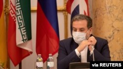 FILE - Iran's top nuclear negotiator, Abbas Araqchi, attends a meeting of the JCPOA Joint Commission in Vienna, Austria, Sept. 1, 2020. (EEAS/Handout via Reuters)