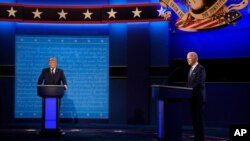 President Donald Trump and Democratic presidential candidate former Vice President Joe Biden during the first presidential debate in Cleveland, Ohio, Sept. 29, 2020.