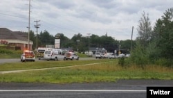 Two Fredericton police officers are among four people killed in the shooting, suspect is in custody. (Twitter/@globalnews)