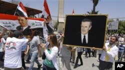 Des manifestants pro-gouvernementaux dans les rues en Syrie