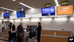 Israelis prepare to fly to Dubai at the Ben Gurion airport near Tel Aviv, Israel, Dec. 3, 2020.