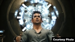 Quaid (Colin Farrell) seated in the Mind Trip Chair inside the Rekall Tripping Den in Columbia Pictures' action thriller TOTAL RECALL.