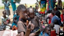 Une famille installée dans la région d'Aweil, au Soudan du Sud, le 16 septembre 2016.