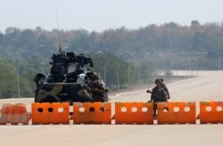 Myanmar's military checkpoint is seen on the way to the congress compound in Naypyitaw, Myanmar, Feb. 1, 2021.