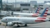 Des avions d'American Airlines sur le tarmac à l'aéroport international de Boston, dans le Massachusetts, le 21 juillet 2021.