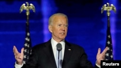 Democratic US presidential nominee Joe Biden addresses supporters at an election rally, after news media announced that Biden has won the 2020 US presidential election, in Wilmington, Del., Nov 7, 2020.