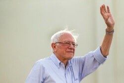 FILE - Democratic presidential candidate Sen. Bernie Sanders, I-Vt., waves to supporters as he arrives at a rally at Santa Monica High School Memorial Greek Amphitheater in Santa Monica, Calif., July 26, 2019.