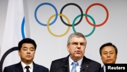 国际奥委会主席托马斯巴赫与韩国和朝鲜奥委会官员在洛桑会谈后举行记者会(2018年1月20日)