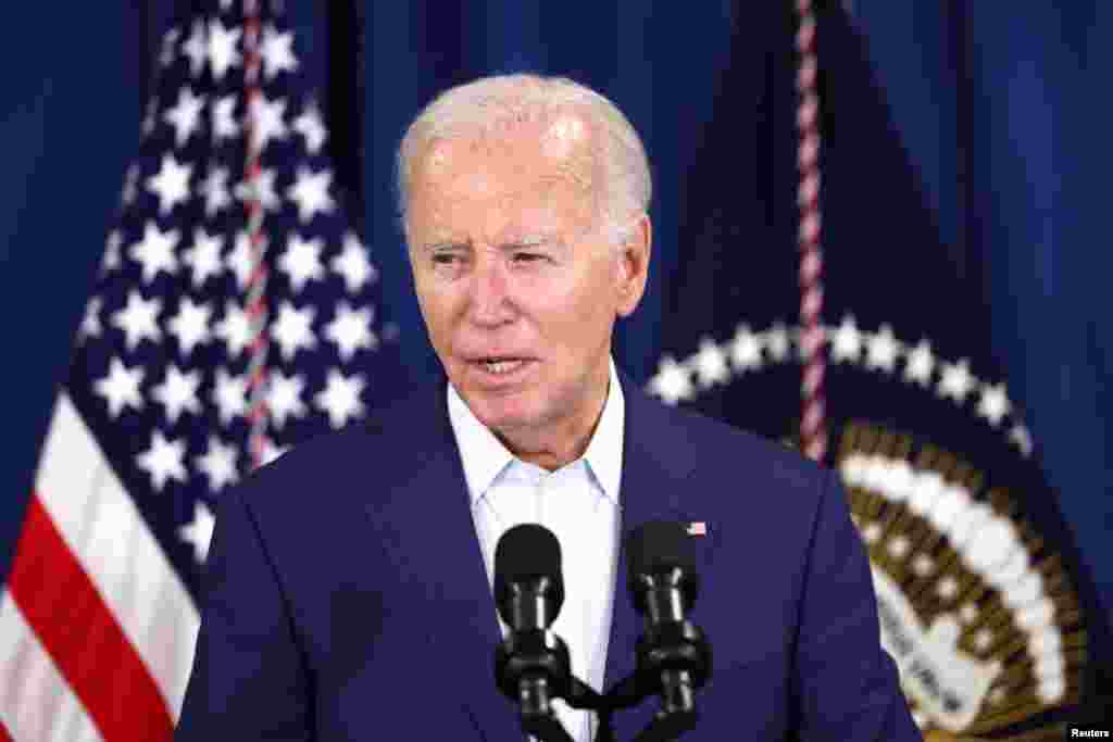Mokonzi oyo azali na ebonga na ekolo Amerika démocrate Joe Biden apameli bomeki koboma mbanda na ye ya républicain Donald Trump na masasi wuta Rehoboth Beach, Delaware, 13 sanza ya sambo 2024.