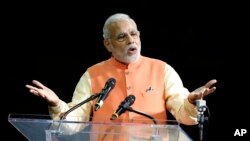 El primer ministro de la India, Narendra Modi se dirige a la comunidad india-estadounidense en el Madison Square Garden, el domingo.