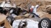 Desplazados por inundaciones en Libia peligran en campos minados en guerra civil