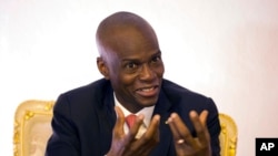 FILE - Haiti's President Jovenel Moise speaks during an interview in his office in Port-au-Prince, Aug. 28, 2019. Moise was assassinated July 7, 2021, at the presidential residence.