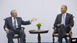 FILE - President Barack Obama meets with Cuban President Raul Castro during the Summit of the Americas in Panama City, April 11, 2015.
