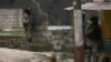 Des policiers montent la garde lors d'une opération anti-gang dans le quartier de Kenscoff à Port-au-Prince, Haïti, le 3 février 2025. 