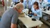 Factory Boss Seeks to Empower His Cambodian Workers