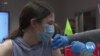 States, Businesses Grapple with New CDC Guidelines on Masks 