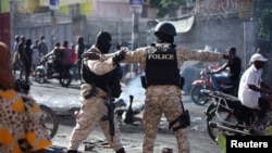 Picha maktaba ya hali baada ya ghasia kati ka raia, Polisi , na makundi ya magenge kwenye mji mkuu wa Haiti wa Port-au-Prince
