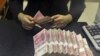 Devaluasi Yuan Bisa Picu Perang Mata Uang di Asia 