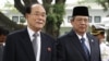 Kim Yong-nam, left, North Korea's president of the Presidium of the Supreme People's Assembly, and Indonesian President Susilo Bambang Yudhoyono walk to a greeting ceremony at the Merdeka Palace, Jakarta, May 15, 2012.