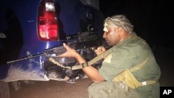 An Iraqi Sunni tribal fighter in Ramadi, the capital of Anbar province, 115 kilometers (70 miles) west of Baghdad, Iraq, early Saturday, May 16, 2015.