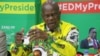 Munyori anoona nezvemutemo muZanu PF, VaPatrick Chinamasa. (Photo: Columbus Mavhunga/VOA) 