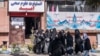 Afghan women who had been studying health studies gather at the Omid Institute of Health Sciences in Kabul, Dec. 3, 2024, a day after the Taliban's Ministry of Health told medical training institute leaders in Afghanistan about a new ban on women's education in the institutes.